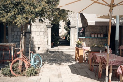 Tables and chairs outside restaurant in Cavtat