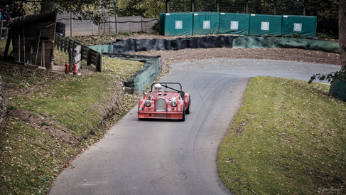Classic car racing up hill at Prescott