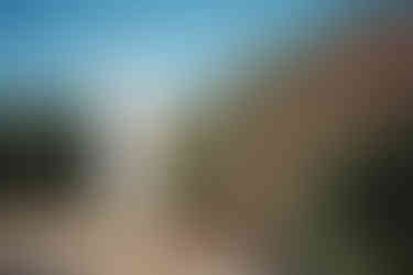 A small church with colourful flowers in Argostoli