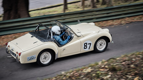 Classic car racing up hill at Prescott