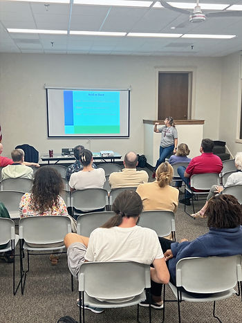 Julie Ruffolo delivers an engaging presentation at September Greener Grove Meeting