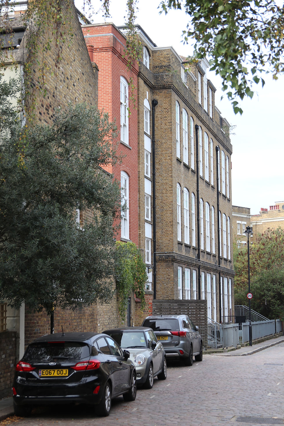 Restored and extended brickwork east façade Chichester Court