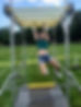 College students completing obstacle challenge course on campus