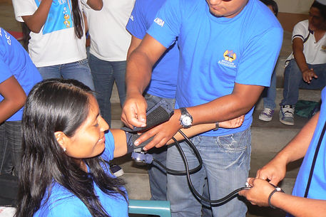 Volunteers taking blood pressure