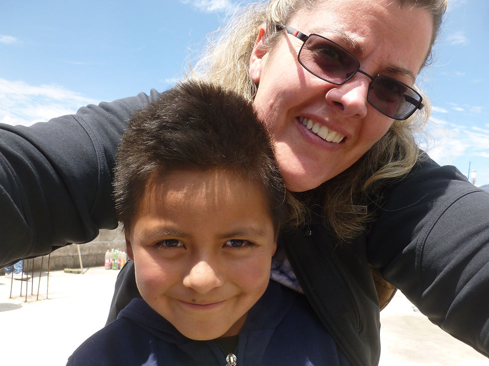 Emily visiting a school in Quito, Ecuador with E=H in 2017