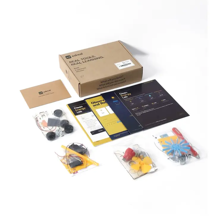 Hands-on STEM learning kit materials arranged on desk.