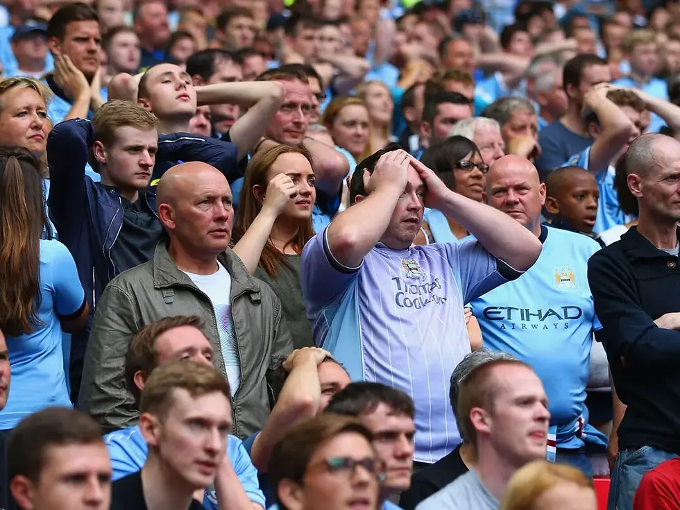 Stunned Manchester City fans UCL 2025.