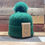 Thumbnail: Cable Knit Bobble Hat with Faux Fur Pom Pom