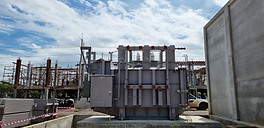 transformer-installation-with-fire-barrier-control-building-construction-background.jpg