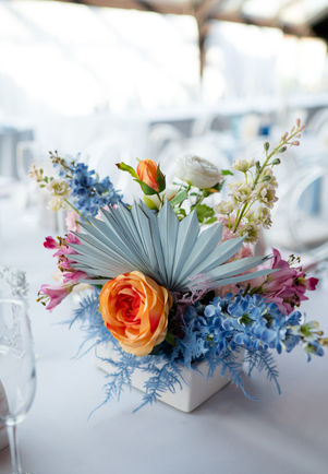 Colorful flowers in vase at centerpiece