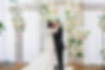 Bride and groom kissing at end of ceremony