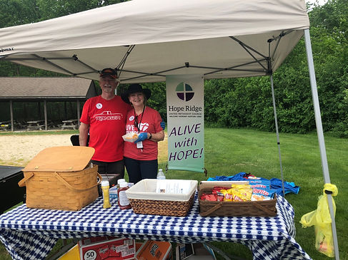 Hope Ridge volunteers serving together at a community picnic in Mentor, Ohio.