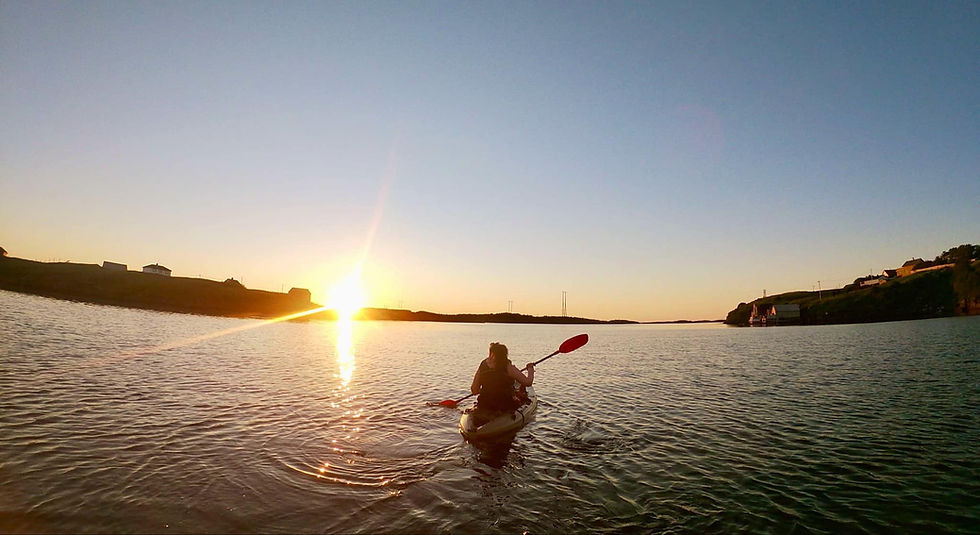 Kajakk i solnedgang