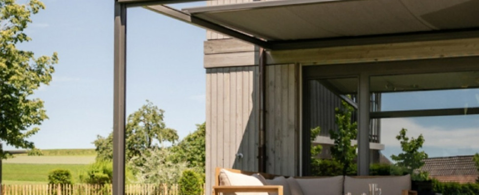 Pergolino retractable pergola awning installed in a Kelowna backyard by Mood Blinds. This weather-resistant Stobag system pro