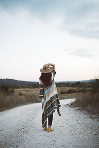 Woman on a Deserted Road