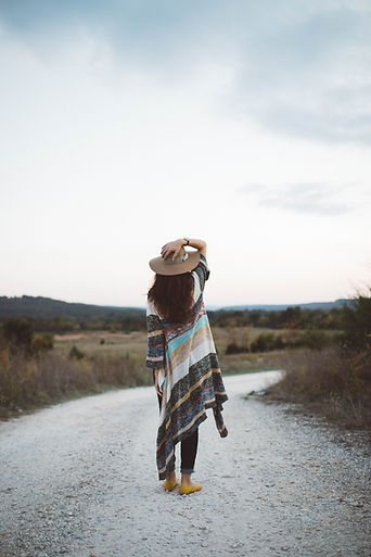 Woman on a Deserted Road
