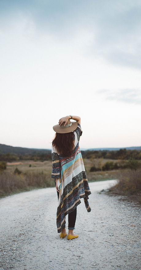 Woman on a Deserted Road