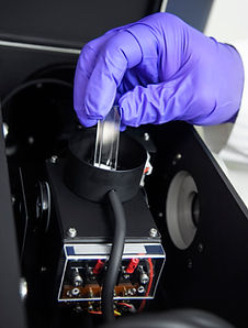 technician-using-machinery-in-laboratory-2022-05-26-04-12-26-utc.jpg