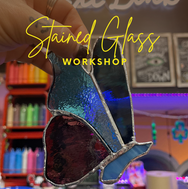 Hand holding beautiful stained glass butterfly. Stained Glass WORKSHOP text.