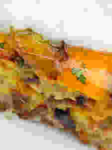 Close-up of Sausage and Mushroom Quiche with Potato Crust