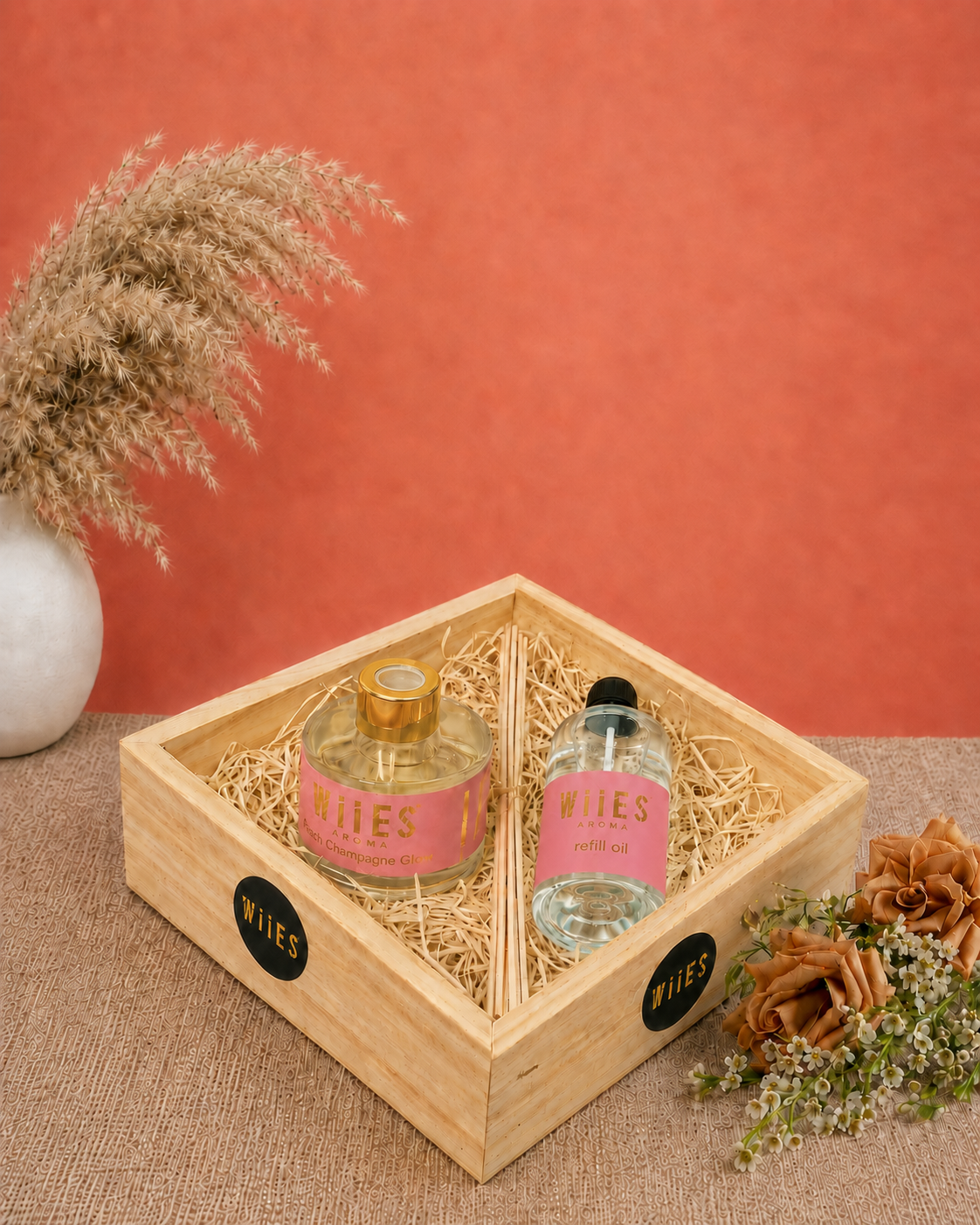 Premium reed fragrance gift hamper with Blush Champagne Glow reed bottle refill oil and reed sticks