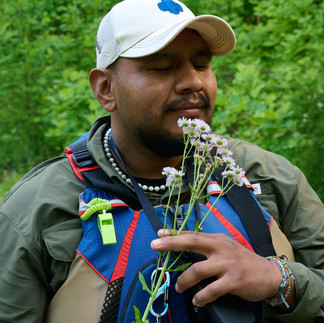 James smelling asters