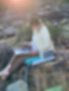 Image of Cheryl Bruce painting en plein air at Terrigal Skillion