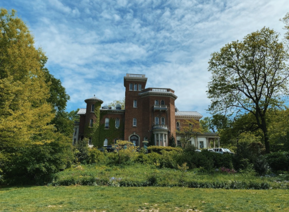 The exterior of Litchfield Villa, surrounded by trees and grass, in Prospect Park, Brooklyn.
