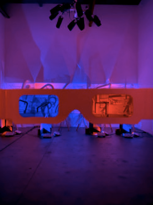 Looking at an installation with red and blue 3D glasses. Inside the HoloCenter exhibition space.