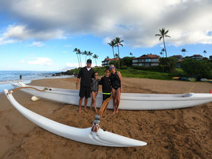 Family on outrigger canoe excursion in Wailea, Maui