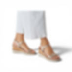 Tamaris Lucinda bronze metallic wedge sandal worn on foot with light trousers side view showing cork-effect wedge