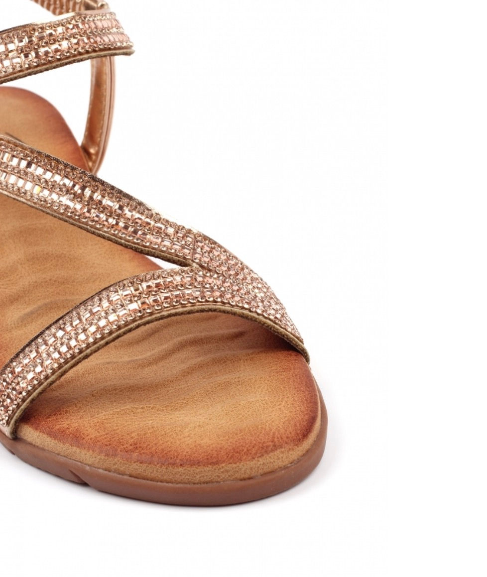 Thumbnail: Close-up of Lunar Darci rose gold sandal showing textured crossover straps and soft padded sole