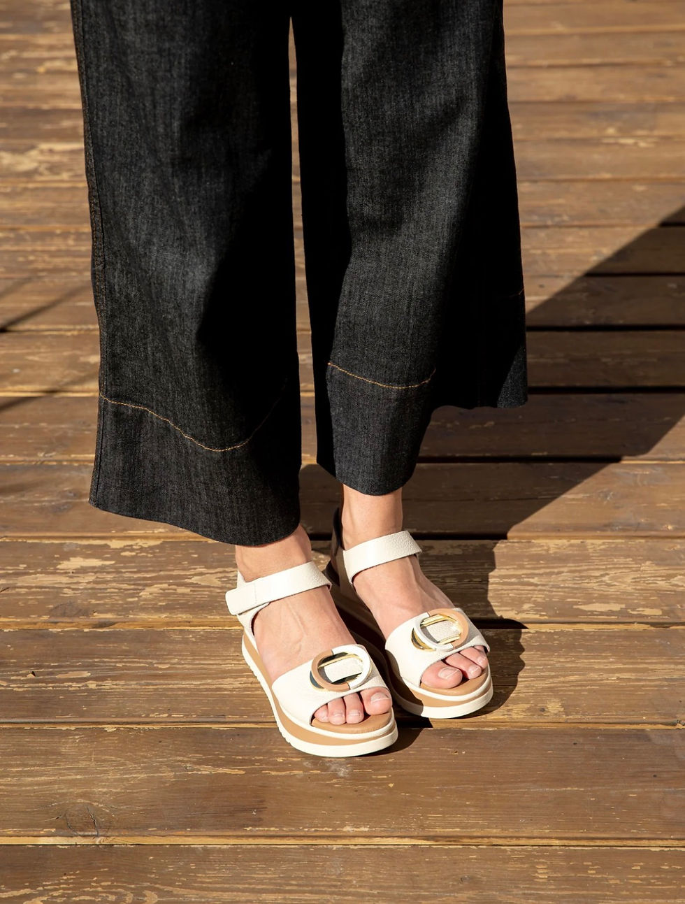 Thumbnail: Top view of Oh! my sandals Tiara wedge sandal worn by model with contrasting dark blue denim