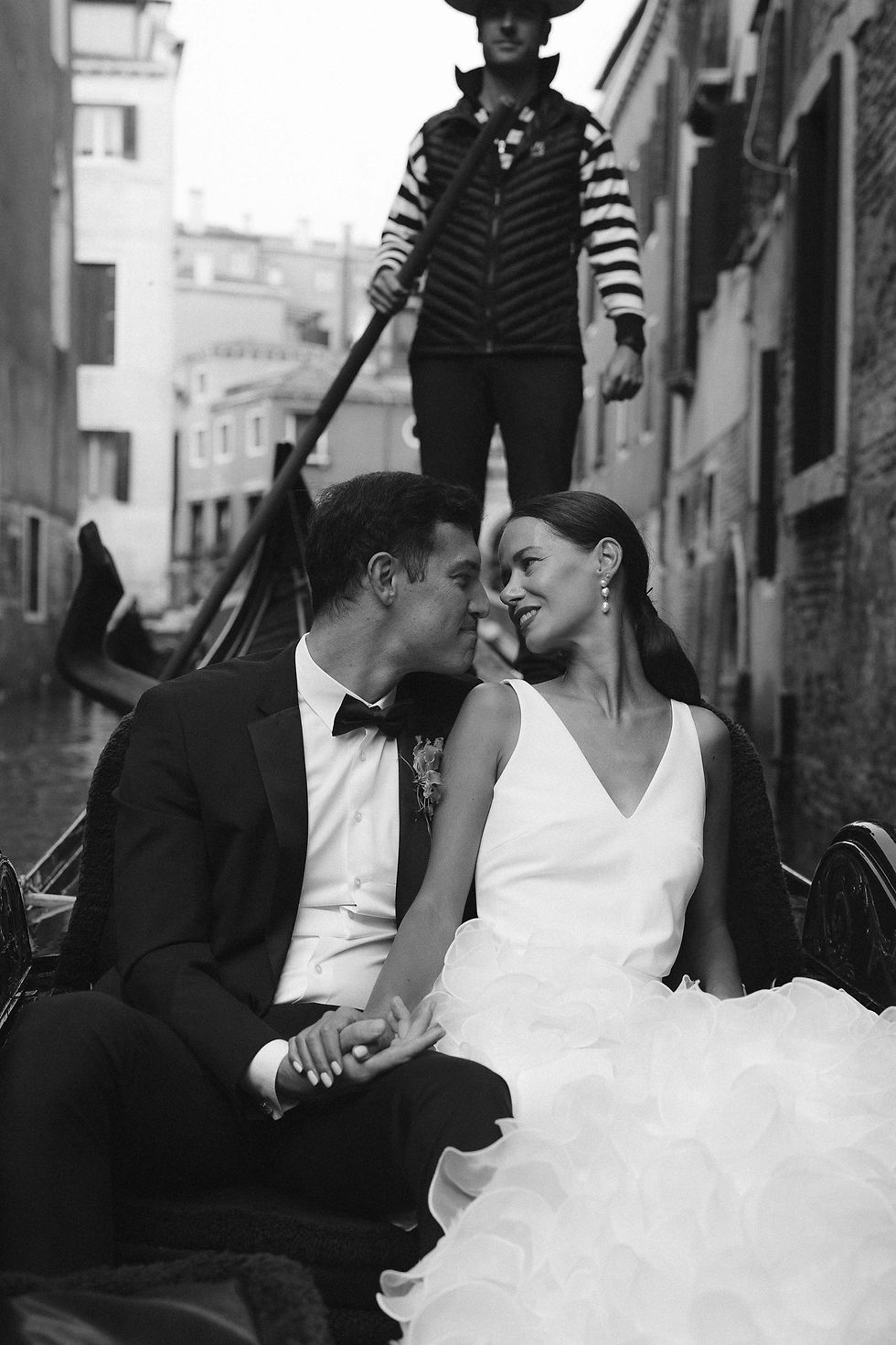 bride and groom on gondola