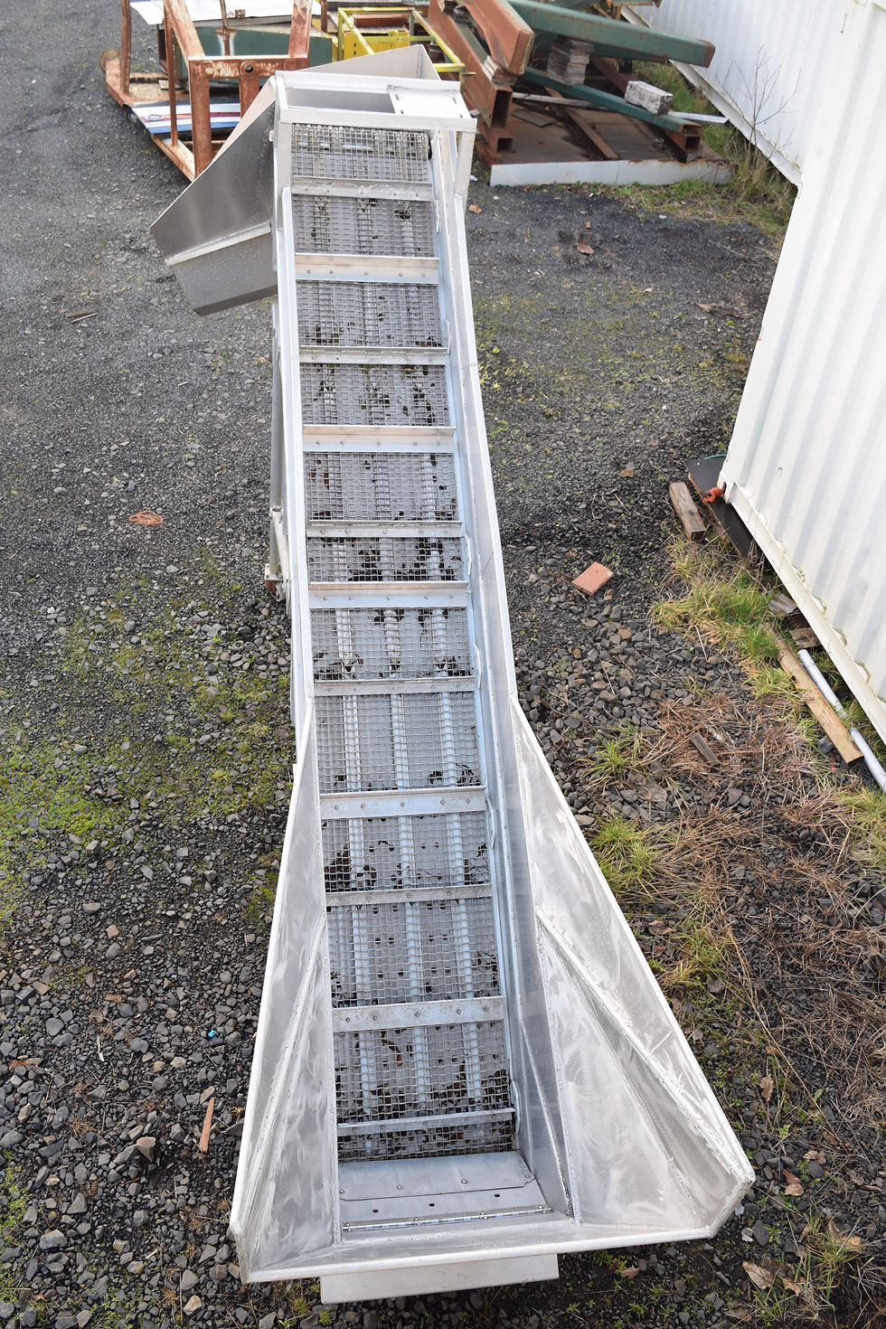 Thumbnail: SCRAP.  SCRAP. Used Aluminum incline linked belt conveyor and hopper