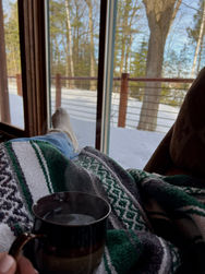 Holding Drink by Window.JPG