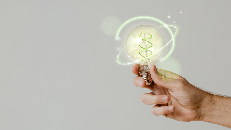 green-energy-with-hand-holding-environmental-light-bulb-background.jpg