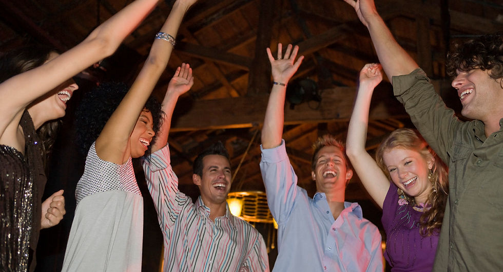 People celebrating together during a corporate event at VirtuPlay Zone.