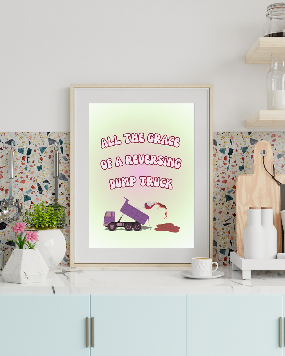 Thumbnail: Green and pink aura background framed art print: "All the grace of a reversing dump truck" with glass of red wine spilling from a truck