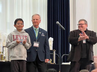 NM Chuck Unruh (center) and OSCO president Mike Waters (right) present Arya Roy Choudhury with his Oklahoma Scholastic Chess Hall of Fame award. Arya is the youngest player ever to have earned that honor. 