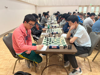 Chess player Lafayette Chen with the black pieces against Kelvin Xie. Chen is Oklahoma's high school chess champion for 2026. He will represent Oklahoma at the GM Arnold Denker National Tournament of High School State Champions, to be held in August in Grand Rapids, Michigan. 