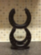 made from Horseshoes bottle rack