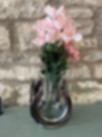 made from horseshoes vase