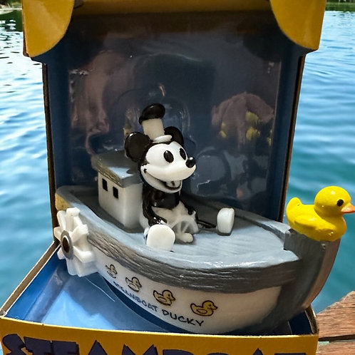 Mickey Mouse on a boat with a rubber duck. Great for bathtime or rubber duck collectors.