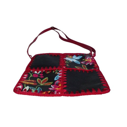 Miniatura: Cartera tejida elegante