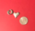 An "o" , a heart, and a quarter.