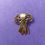 Thumbnail: One decorative angel-shaped brooch, in gold, featuring pearl accents an