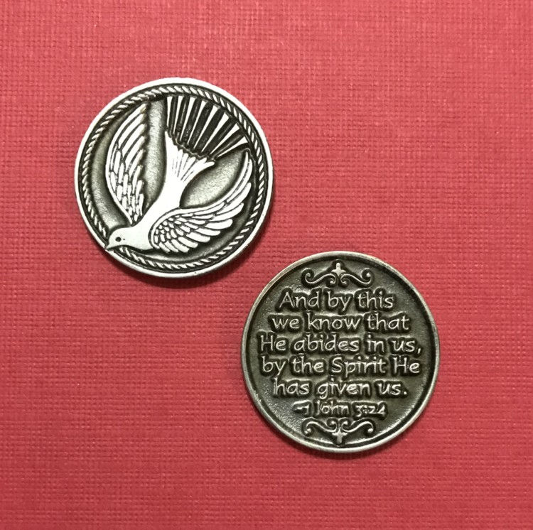 Thumbnail: Front and back of silver tokens on a red background: one side features a dove, while the other has a Bible verse inscribed.