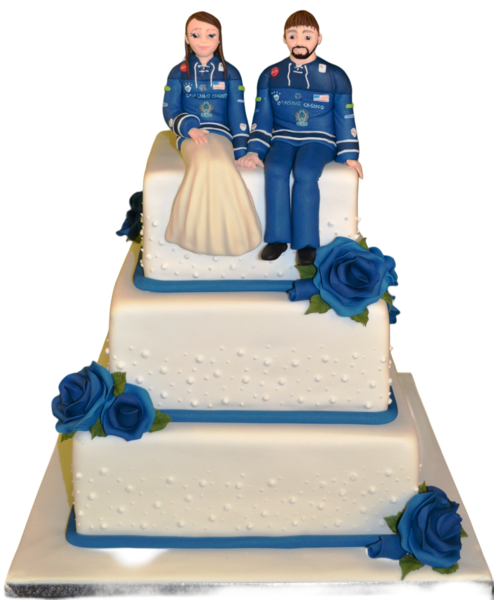 Three-tier wedding cake with white sugar paste and royal blue roses.