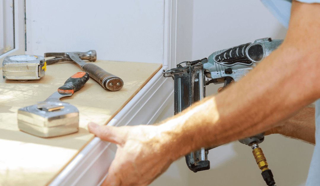 trim work being done on a window